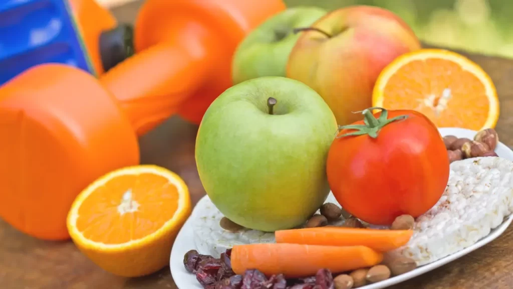 frutas e halteres